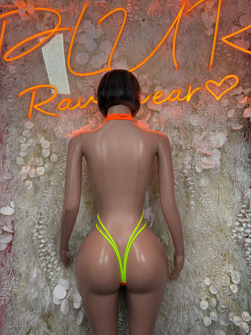 Neon orange rave bodysuit, open back with neon green halter straps