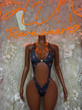 Exotic Dancewear navy cutout strappy bodysuit with front deep oval cutouts
