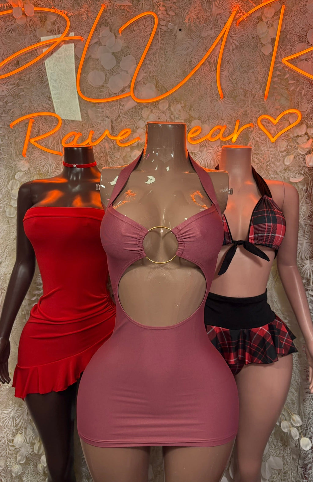 Mauve cutout mini dress with halter neckline, circular ring, and open chest cutout