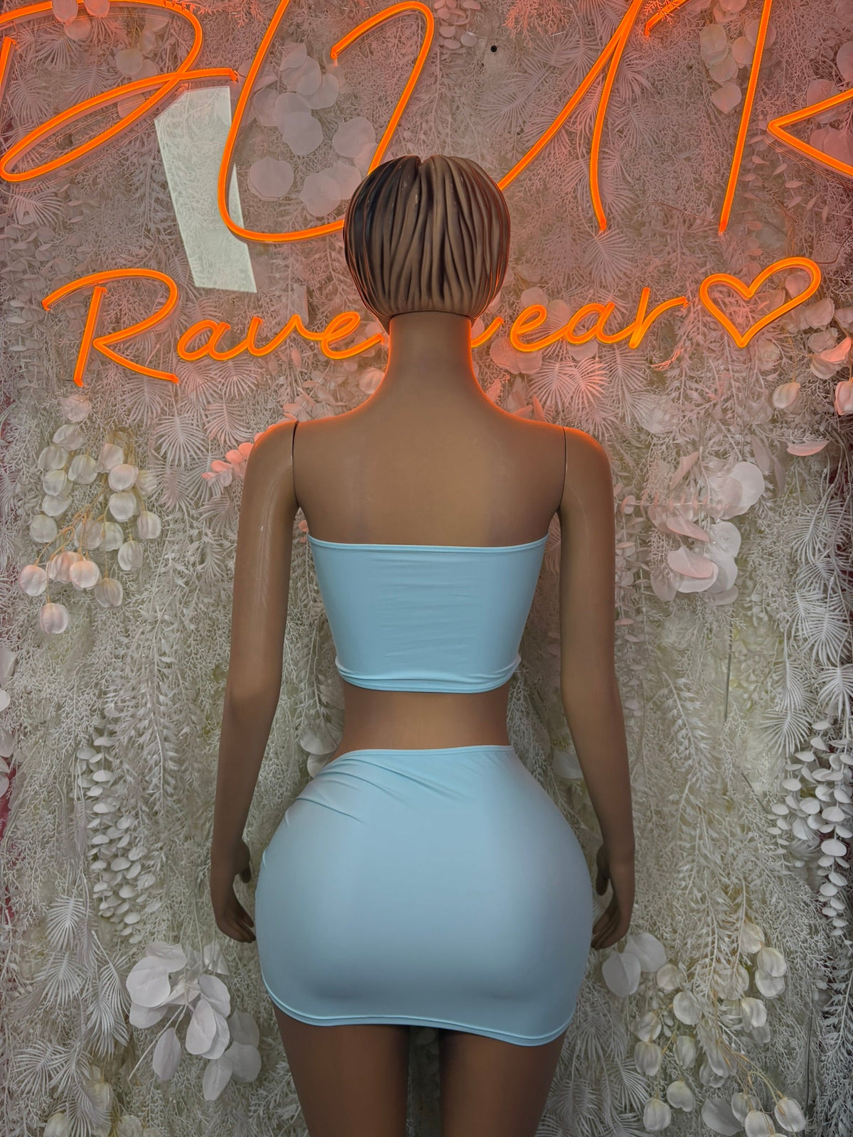 Light blue cutout mini skirt set with bandeau top; back view