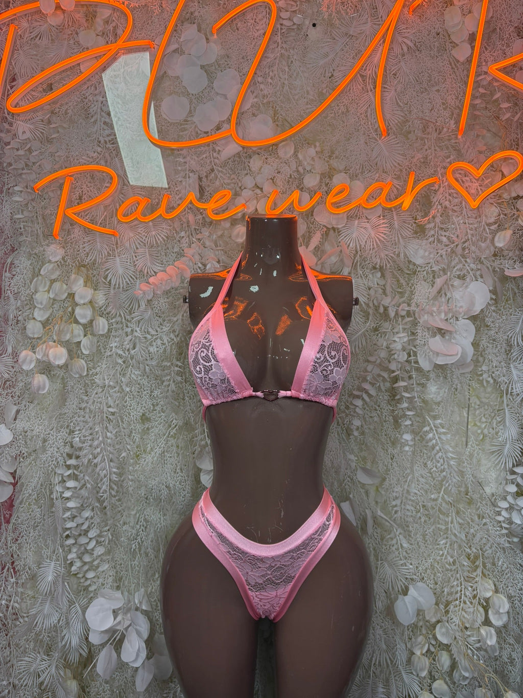 Pink lace triangle bikini set with halter top and high-rise tie side bottoms