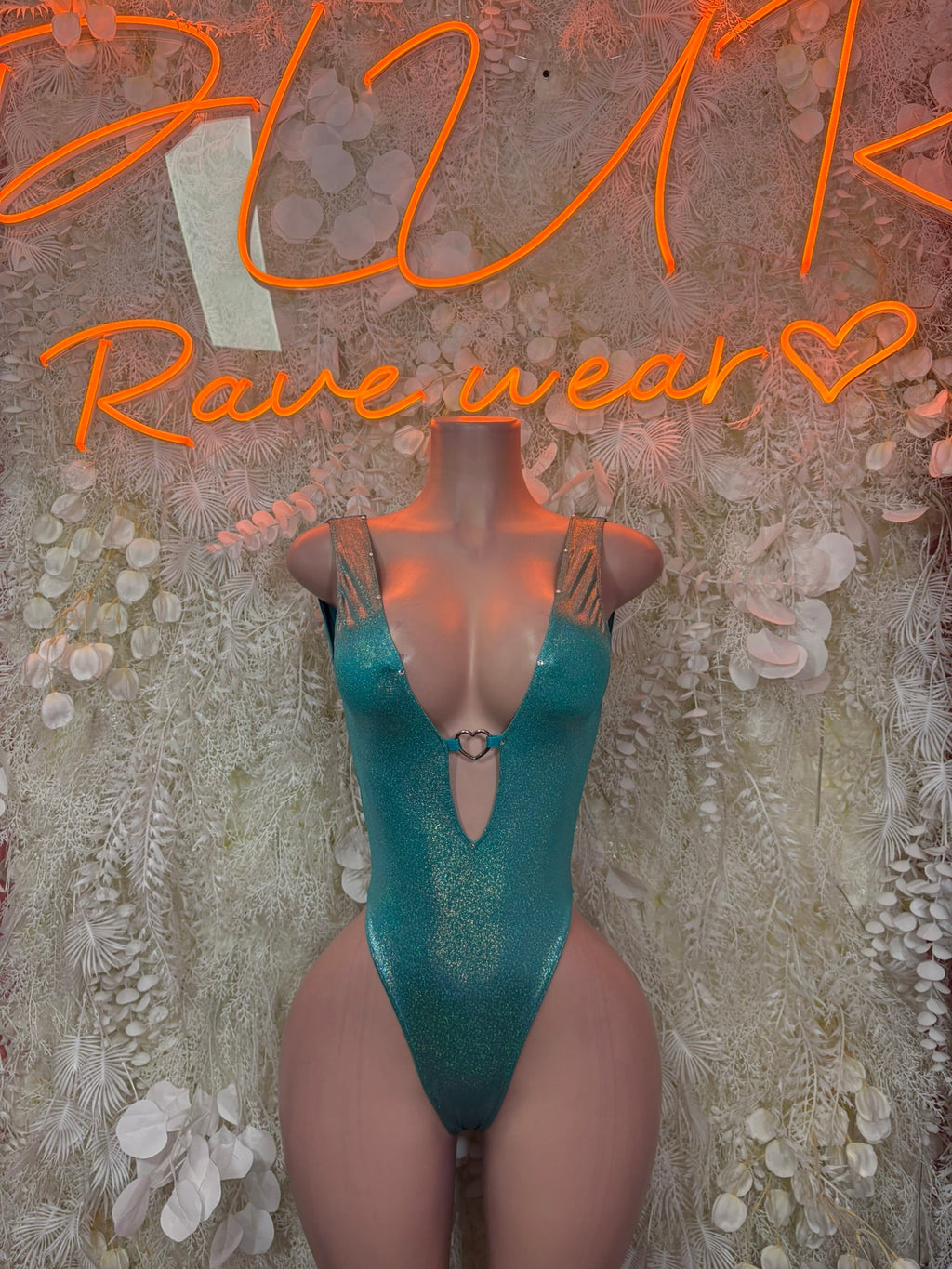 Teal glitter plunge bodysuit with high-cut legs and V-neck front
