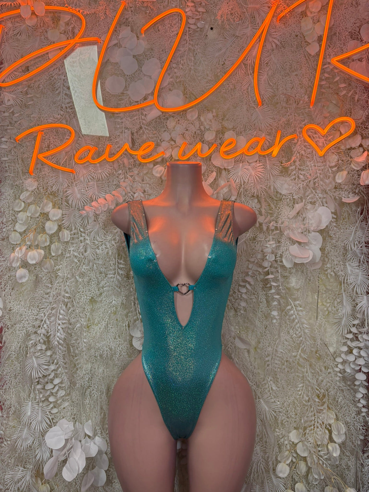 Teal glitter plunge bodysuit with high-cut legs and V-neck front