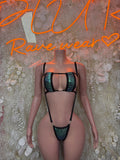 Black micro cutout bodysuit with wide mesh panels and tie-back straps