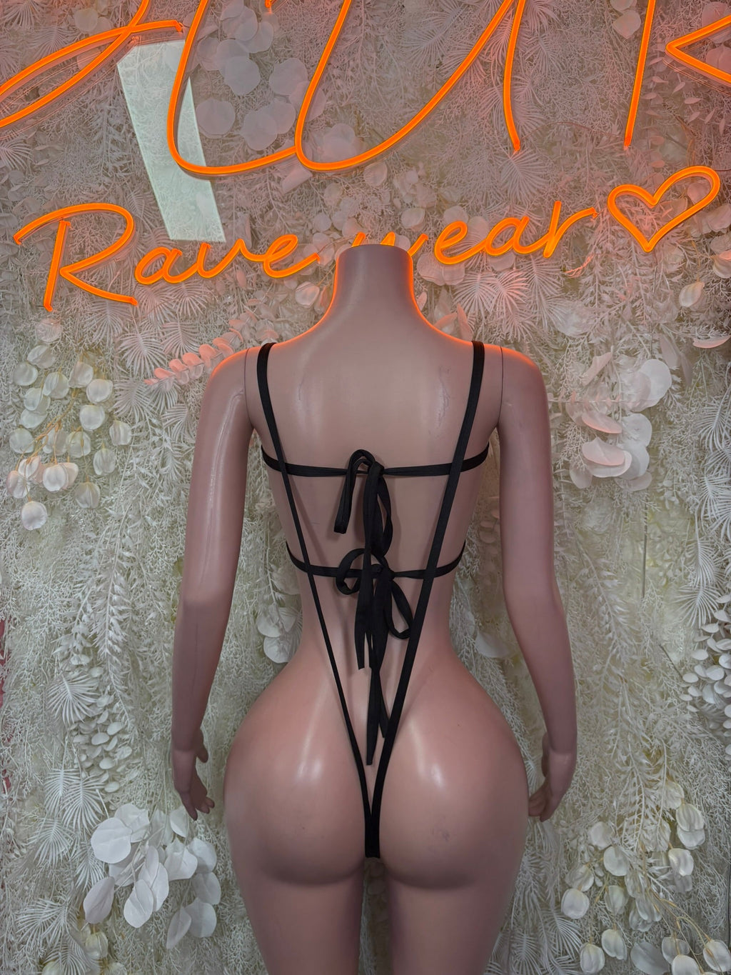 Black micro cutout bodysuit, lace-up back with low coverage