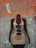 Nude mini dress with triple cutout chest detail and ring hardware