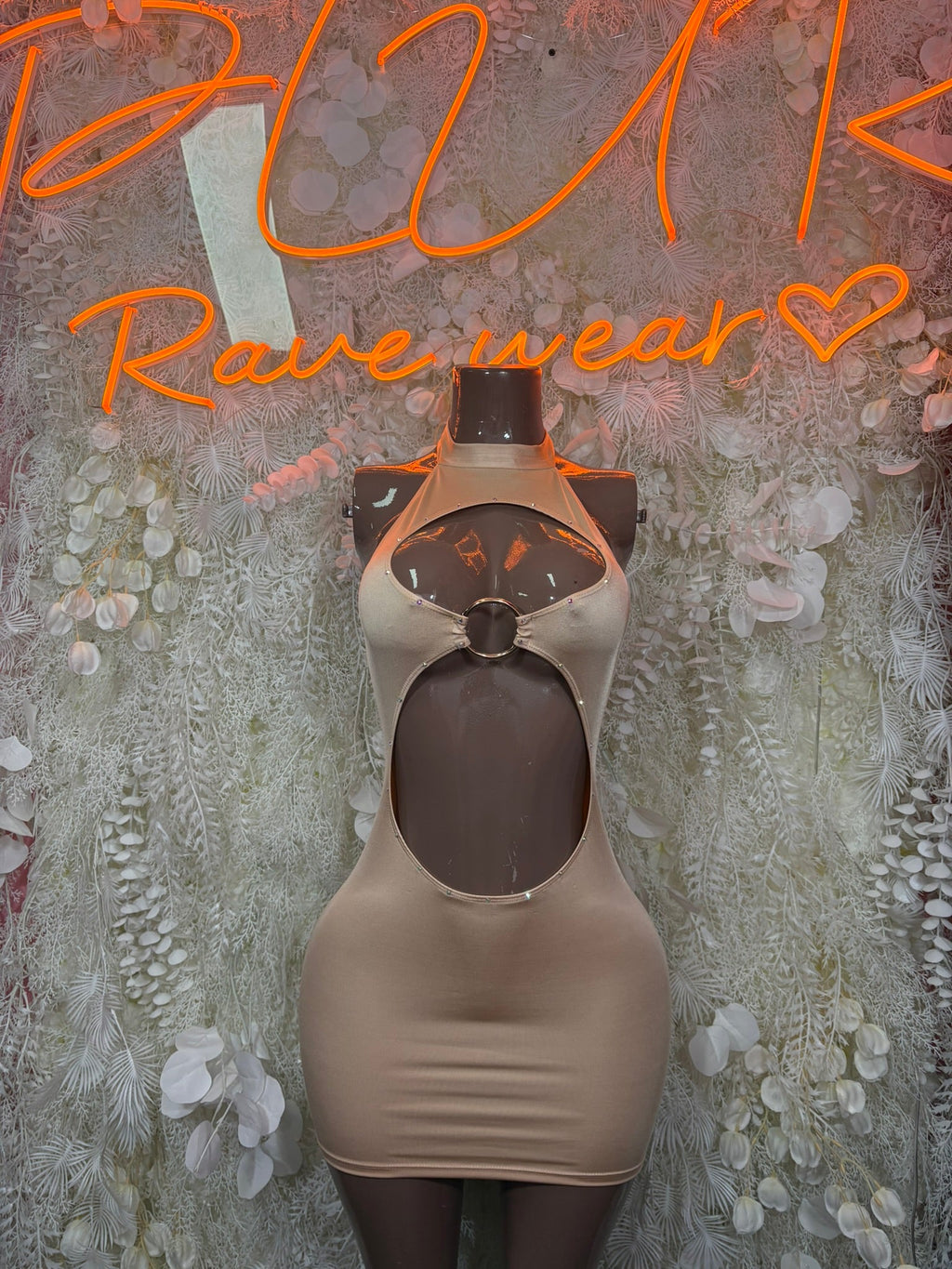 Nude halter mini dress with keyhole cutout at the front