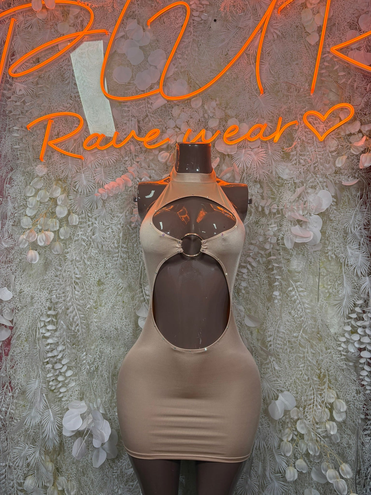 Nude halter mini dress with keyhole cutout at the front