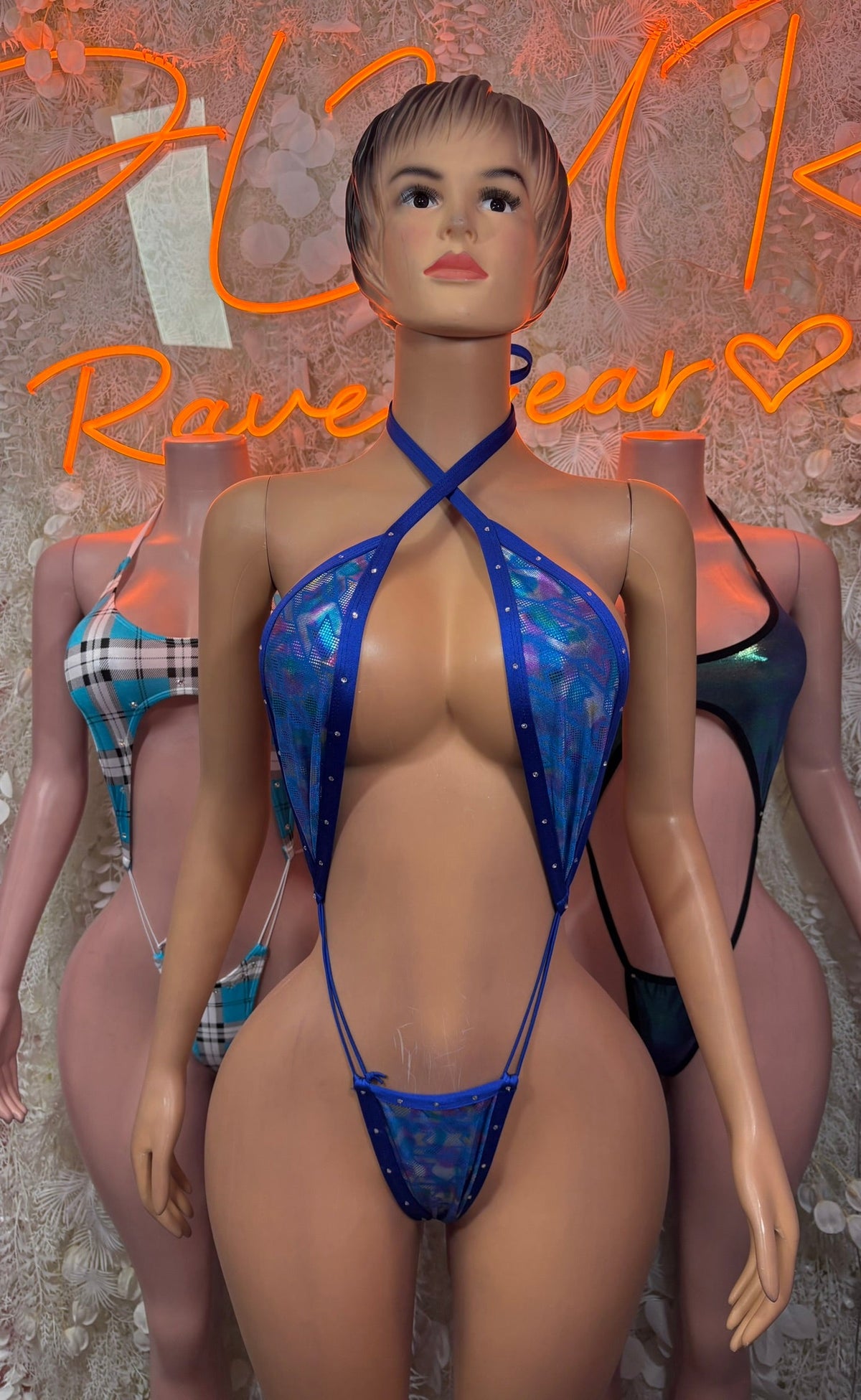 Blue cutout halter monokini bodysuit with crisscross straps and back thong