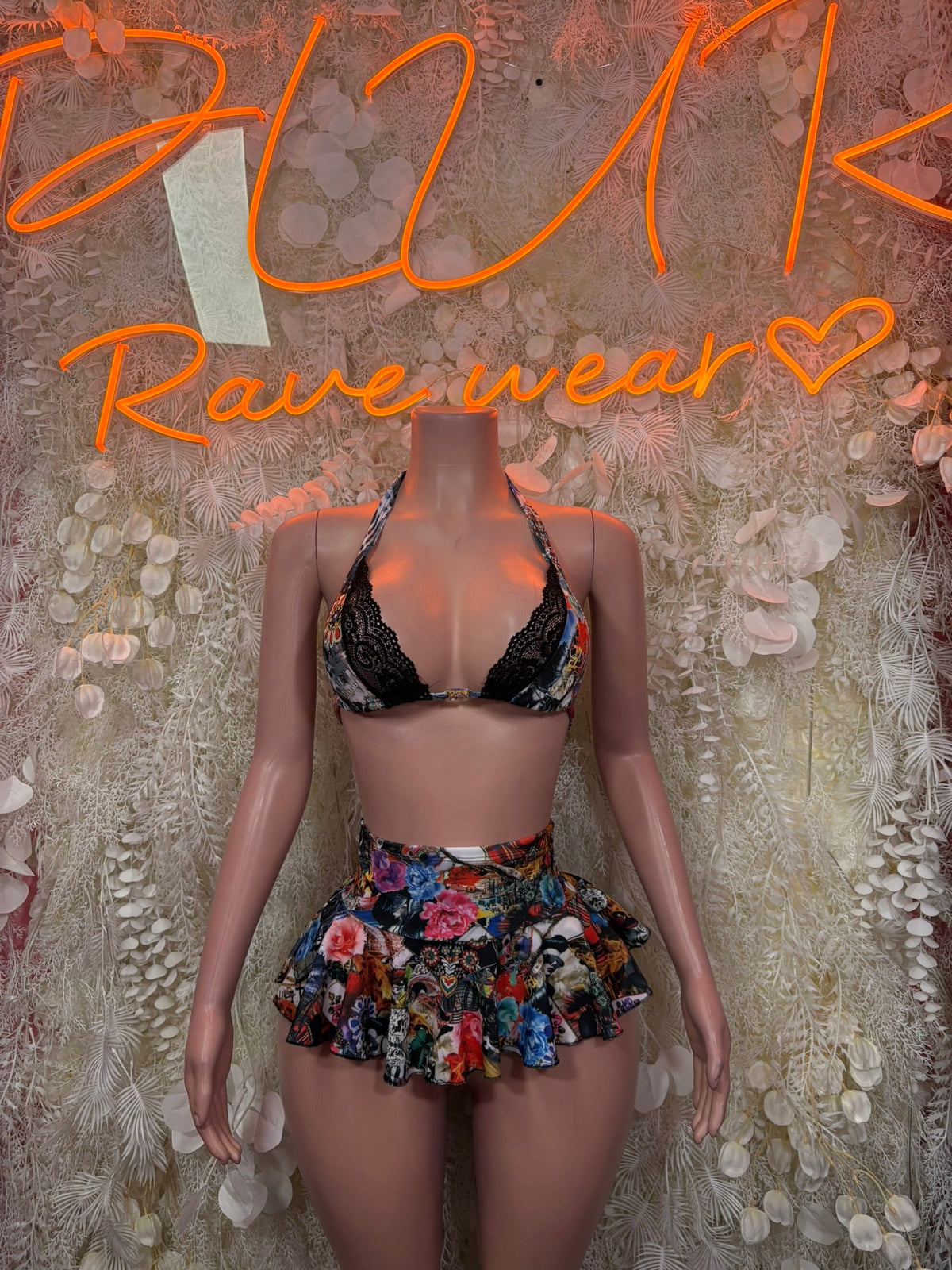 Festival bikini ruffle skirt set with black floral bra and matching ruffle skirt