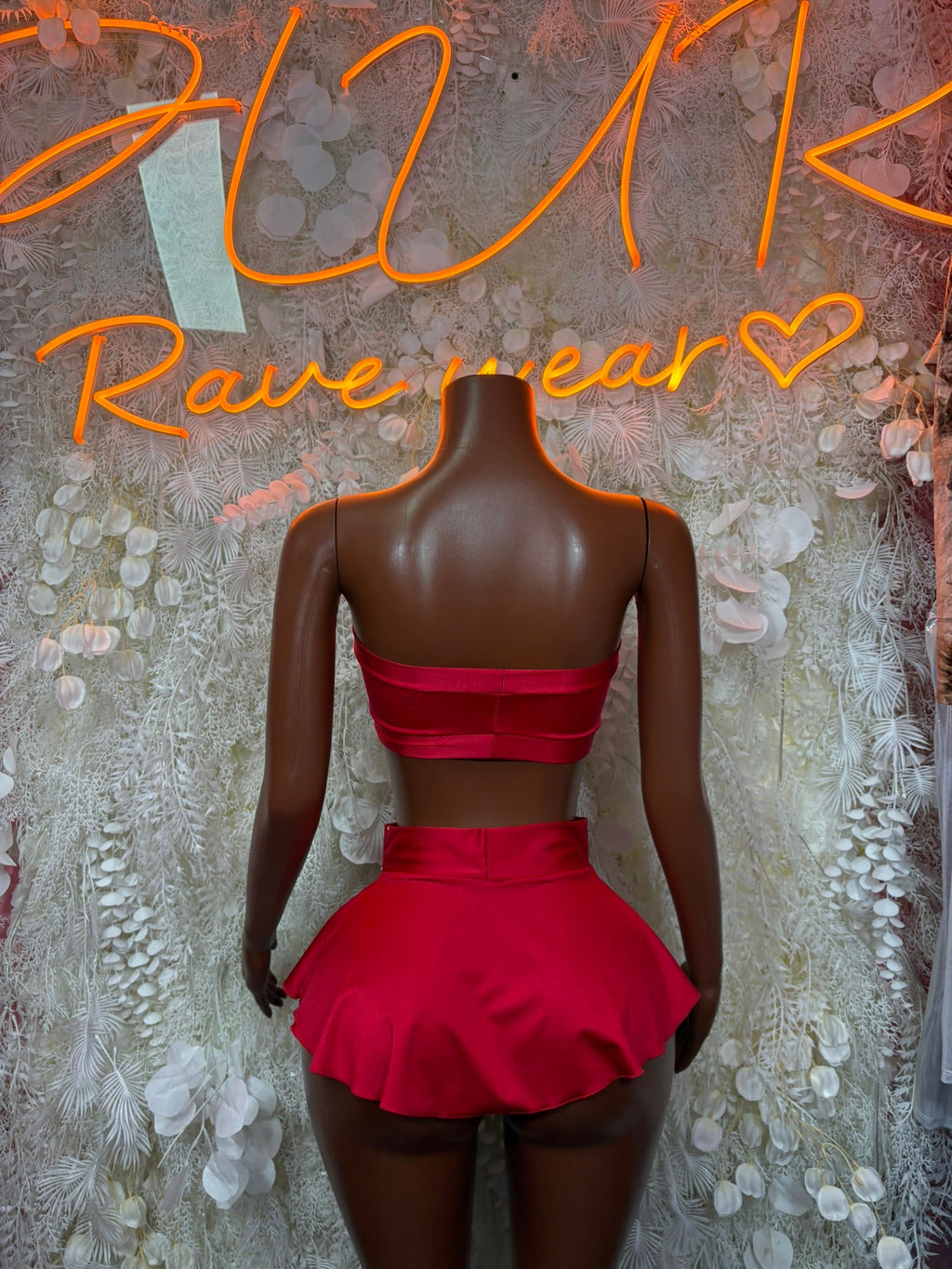 Red bandeau back and mini skirt with center bow, ruched waistband