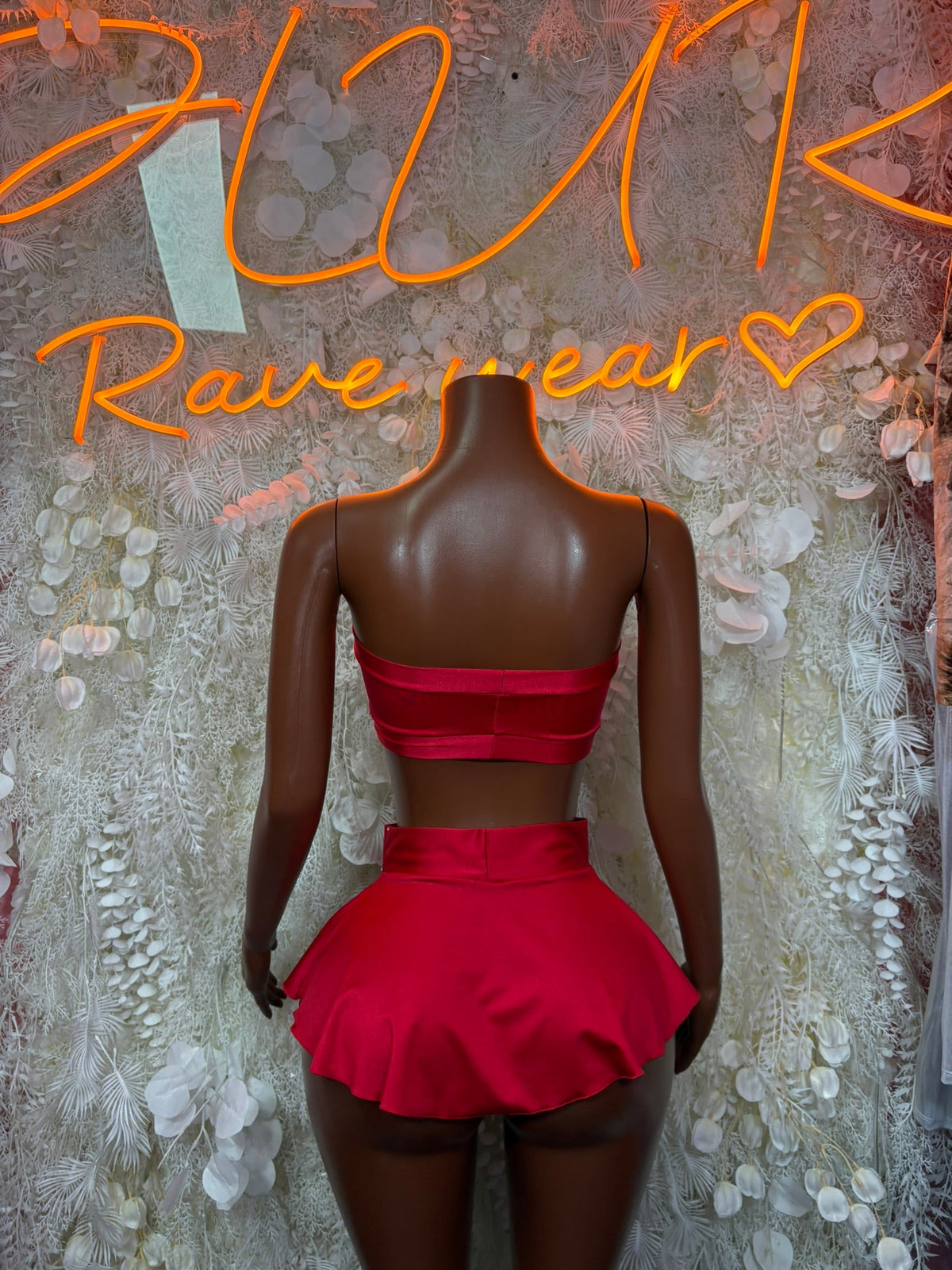 Red bandeau back and mini skirt with center bow, ruched waistband