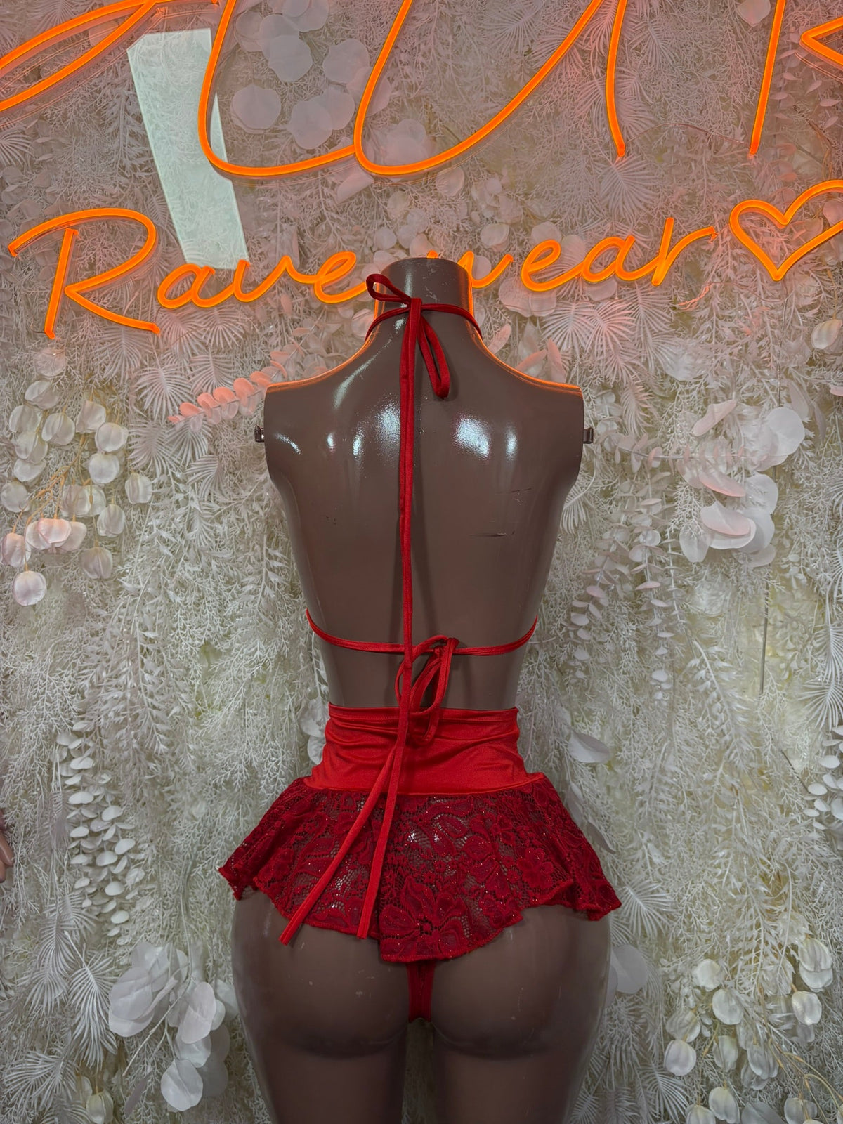 Red lace halter bikini set with tied back and ruffled mini skirt