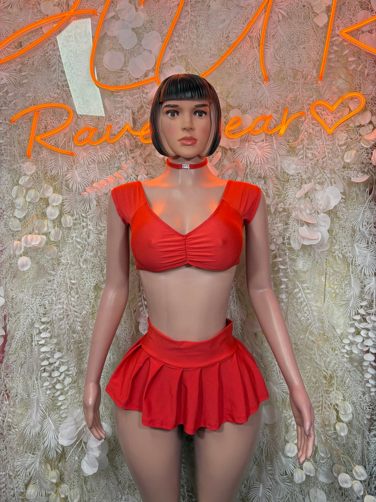 Red ruched short-sleeve crop top and ruffled mini skirt set, front view