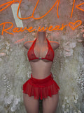 Red halter bikini top with ruffle skirt overlay, front view