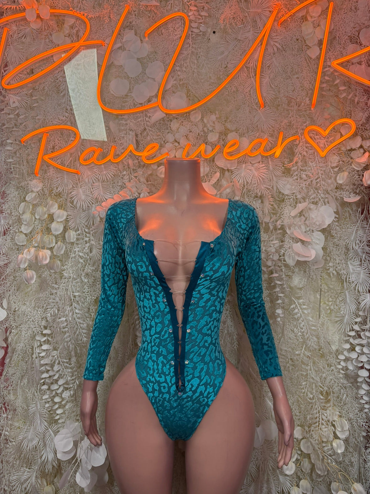 Teal glitter bodysuit with deep V plunge, long sleeves, black leopard print