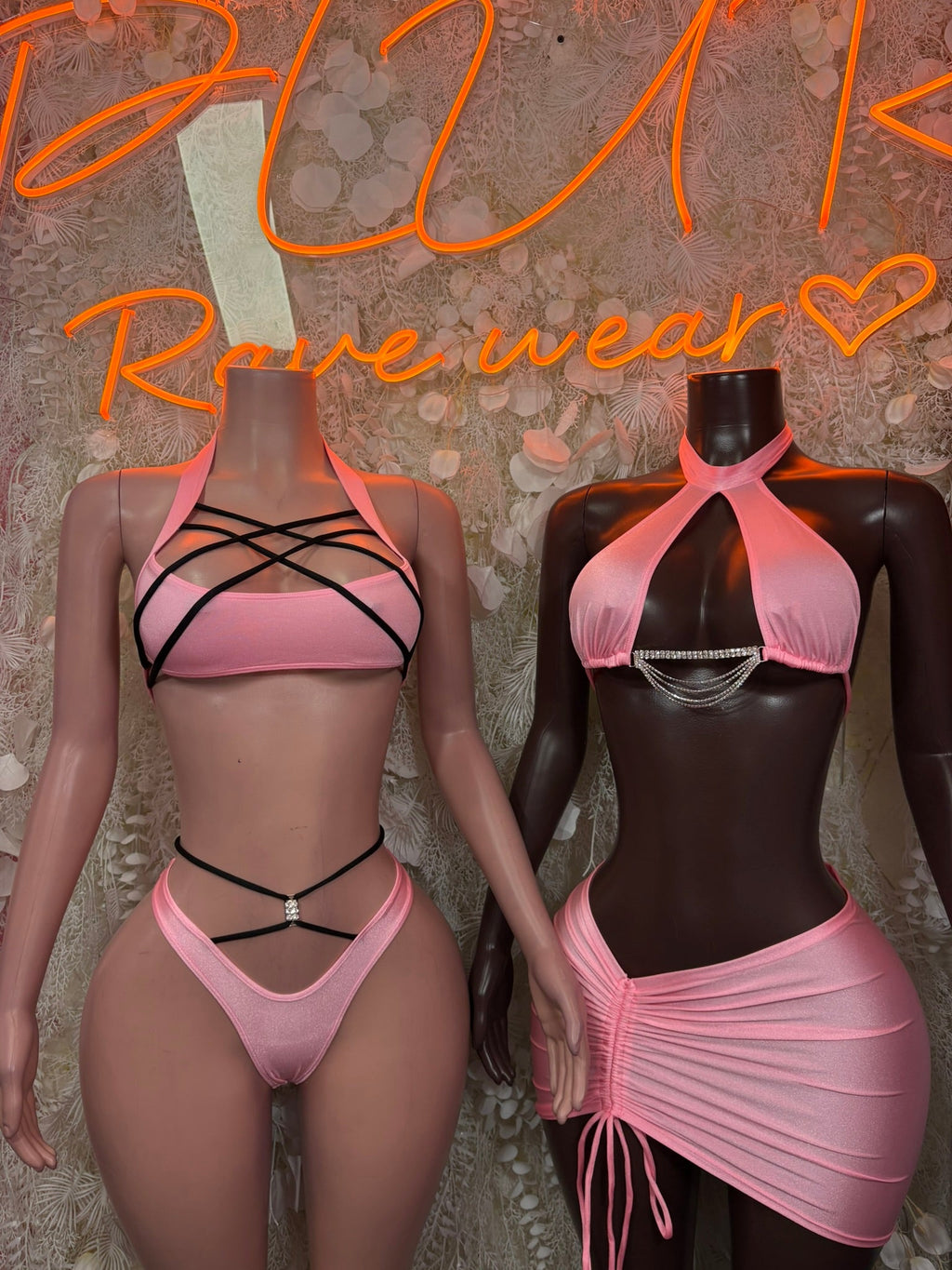 Pink strappy cutout bodysuit with halter neckline and ruched side ties