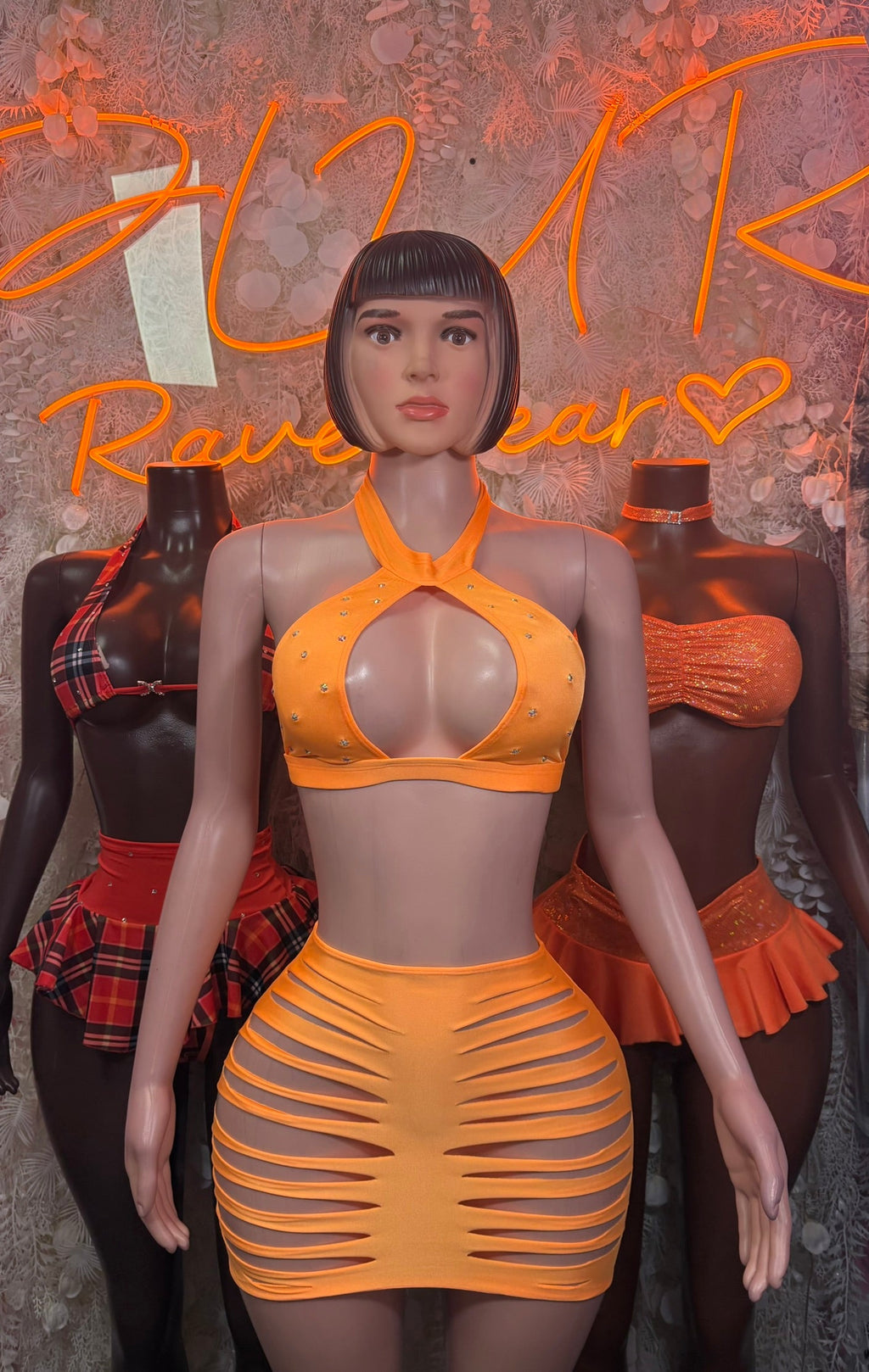 Orange halter crop top and orange slashed mini skirt costume set