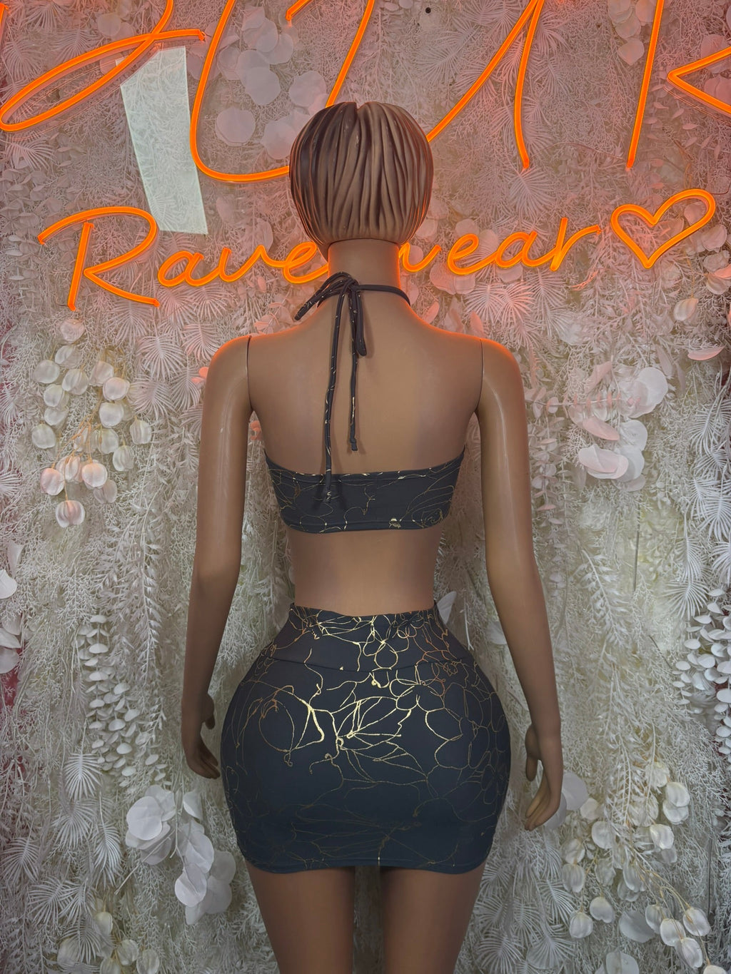 Charcoal lace bra back straps and matching mini skirt, back view