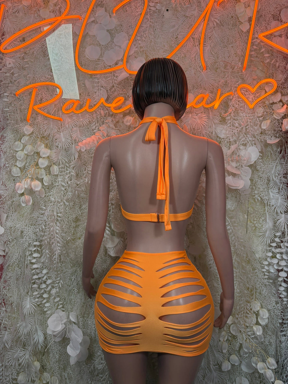 Orange halter back-tie crop top and slashed mini skirt set, rear view