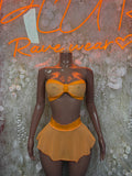 Peach sheer ruffle bikini set with bandeau top and bow front, mini skirt