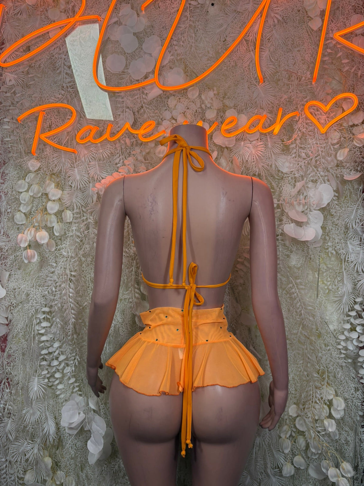 Orange halter backless ruffle top with tie straps and matching mini skirt