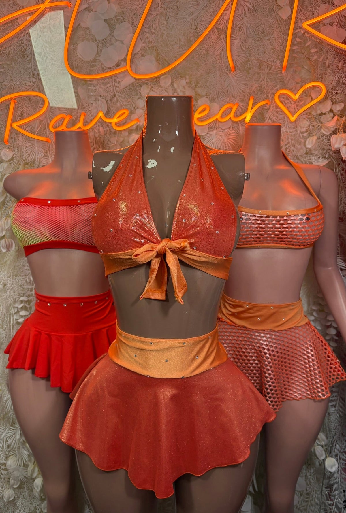 Red ruffle mini skirt with mesh bandeau top and striped trim