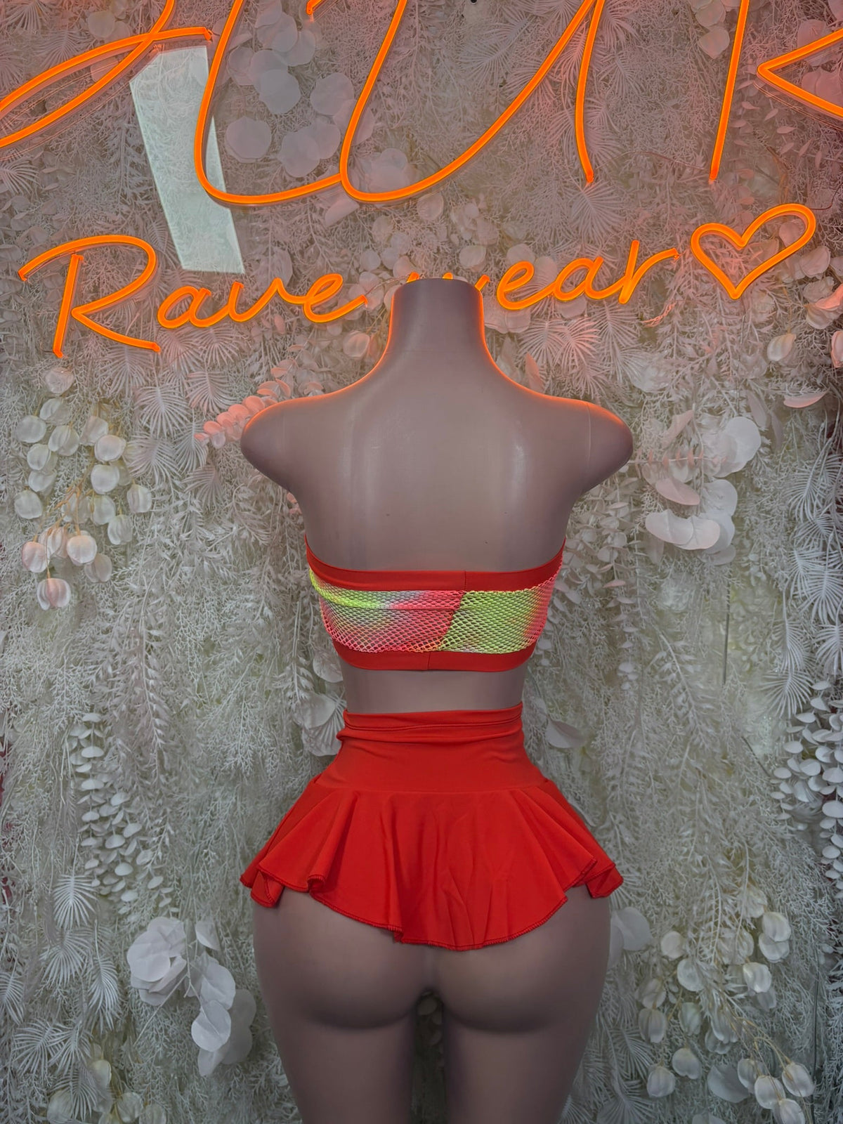 Red mesh bandeau top with striped trim and red ruffle mini skirt costume set