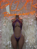 Purple sheer plunge halter bodysuit with center bow detail and open-front straps