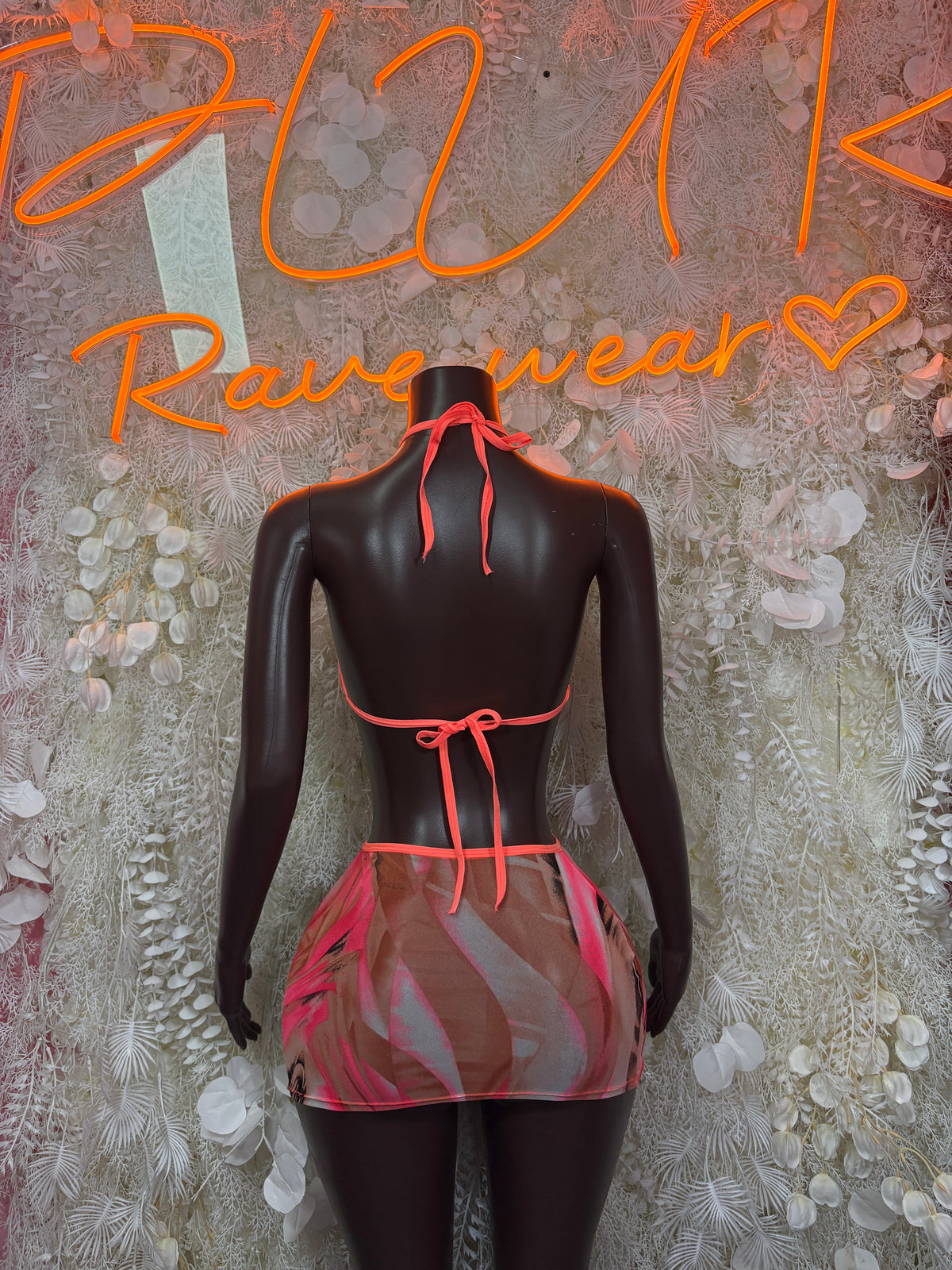 Red halter bikini top and abstract mini skirt set with back tie strings